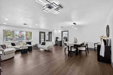 Situated on a rare, oversized lot with serene pond views, this - photo 11