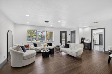 Situated on a rare, oversized lot with serene pond views, this - photo 12