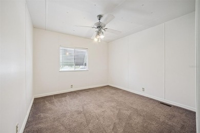 Beautifully maintained manufactured home featuring a spacious - photo 13