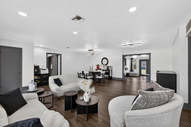 Situated on a rare, oversized lot with serene pond views, this - photo 14