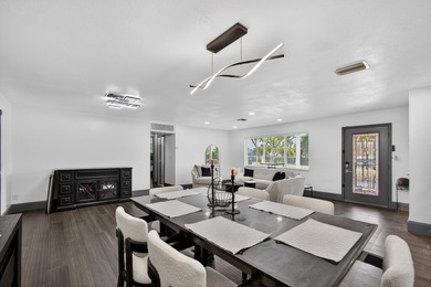 Situated on a rare, oversized lot with serene pond views, this - photo 17