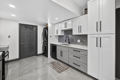 Situated on a rare, oversized lot with serene pond views, this - photo 20