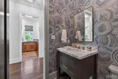 Experience elevated living in this exemplary residence in the - photo 22