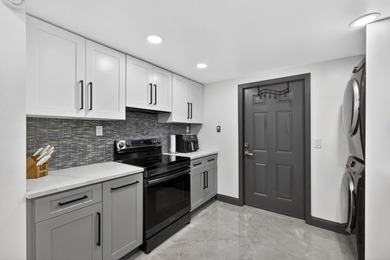 Situated on a rare, oversized lot with serene pond views, this - photo 22