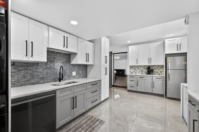 Situated on a rare, oversized lot with serene pond views, this - photo 23