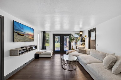 Situated on a rare, oversized lot with serene pond views, this - photo 24