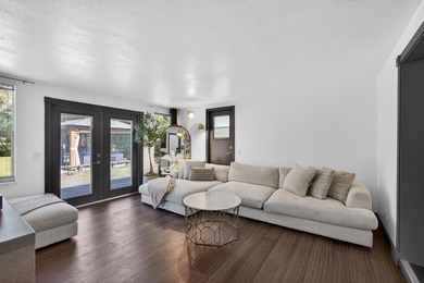 Situated on a rare, oversized lot with serene pond views, this - photo 25