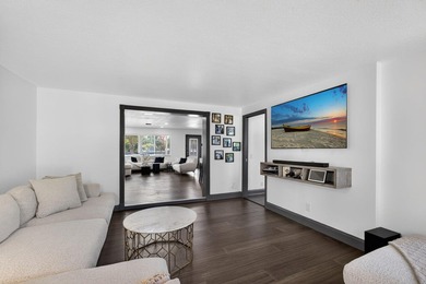 Situated on a rare, oversized lot with serene pond views, this - photo 26