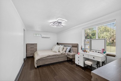 Situated on a rare, oversized lot with serene pond views, this - photo 27