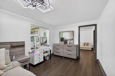 Situated on a rare, oversized lot with serene pond views, this - photo 28