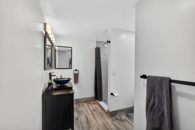 Situated on a rare, oversized lot with serene pond views, this - photo 31