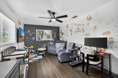 Situated on a rare, oversized lot with serene pond views, this - photo 34