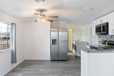 Welcome to easy Florida living in the Pine Acres community of - photo 6
