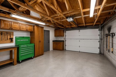 Situated on a rare, oversized lot with serene pond views, this - photo 39