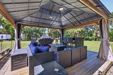 Situated on a rare, oversized lot with serene pond views, this - photo 43