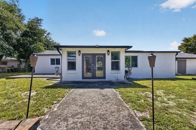 Situated on a rare, oversized lot with serene pond views, this - photo 46