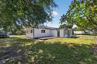 Situated on a rare, oversized lot with serene pond views, this - photo 49