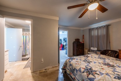 ENJOY THE QUIET OF THE COUNTRY ON THIS BEAUTIFUL 10-ACRE TRACT