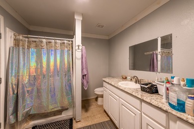 ENJOY THE QUIET OF THE COUNTRY ON THIS BEAUTIFUL 10-ACRE TRACT