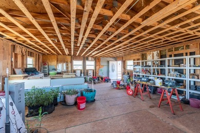 ENJOY THE QUIET OF THE COUNTRY ON THIS BEAUTIFUL 10-ACRE TRACT