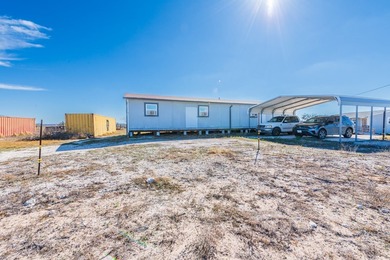 ENJOY THE QUIET OF THE COUNTRY ON THIS BEAUTIFUL 10-ACRE TRACT