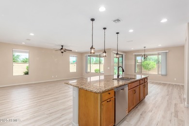 Enjoy resort-style living in Sun City Festival, a premier 55+