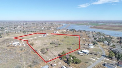 ENJOY THE QUIET OF THE COUNTRY ON THIS BEAUTIFUL 10-ACRE TRACT
