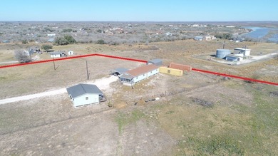 ENJOY THE QUIET OF THE COUNTRY ON THIS BEAUTIFUL 10-ACRE TRACT