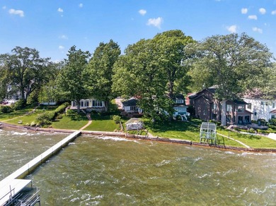 The value is in the setting-53 feet of Lake Wawasee frontage, a - photo 5