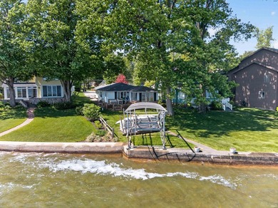 The value is in the setting-53 feet of Lake Wawasee frontage, a - photo 6