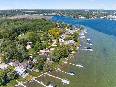 The value is in the setting-53 feet of Lake Wawasee frontage, a - photo 8