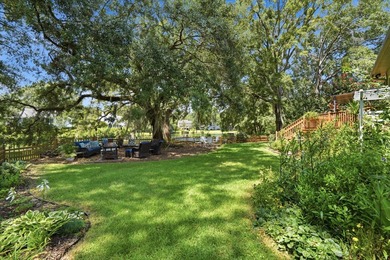 Enjoy the peaceful setting under the beautiful oak trees with - photo 9