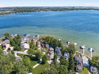 The value is in the setting-53 feet of Lake Wawasee frontage, a - photo 9