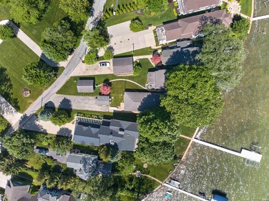 The value is in the setting-53 feet of Lake Wawasee frontage, a - photo 10