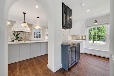 Beautifully updated, embracing its historic character while - photo 12
