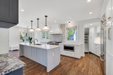 Beautifully updated, embracing its historic character while - photo 13
