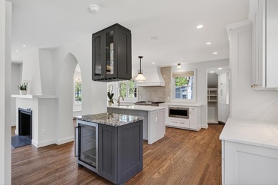 Beautifully updated, embracing its historic character while - photo 17
