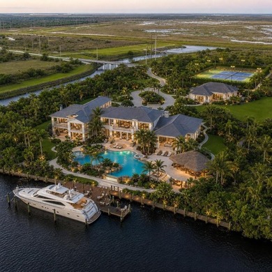 Set along 5+ pristine acres on the storied St. Lucie River, this - photo 3