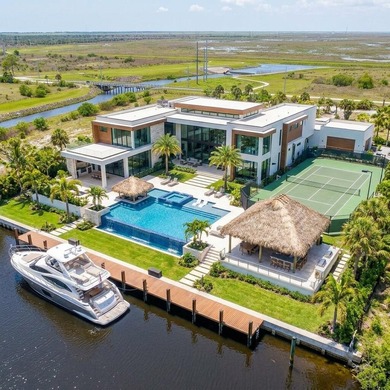 Set along 5+ pristine acres on the storied St. Lucie River, this - photo 5