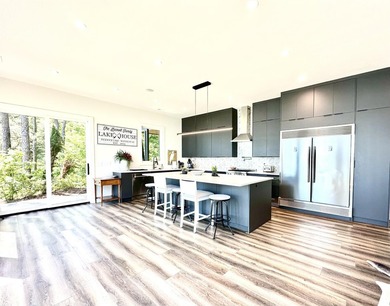 Completed in 2023, this Tennessee River Modern Masterpiece is - photo 6