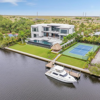 Set along 5+ pristine acres on the storied St. Lucie River, this - photo 6