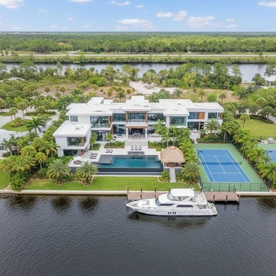 Set along 5+ pristine acres on the storied St. Lucie River, this - photo 7