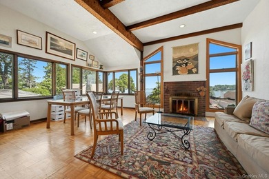 Nestled into the hillside with water views that hold through - photo 7