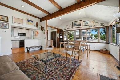 Nestled into the hillside with water views that hold through - photo 9