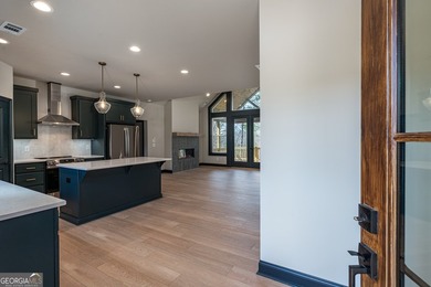 BRAND NEW HOME IN UPSCALE GATED COMMUNITY WITH RIVER ACCESS - photo 2