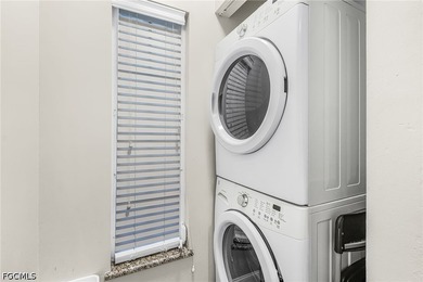 Welcome to this beautifully located first-floor condo in the - photo 5