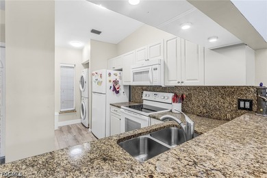 Welcome to this beautifully located first-floor condo in the - photo 6