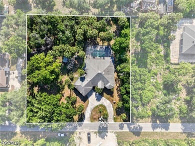 Beautiful property situated on a spacious 1-acre lot with - photo 2