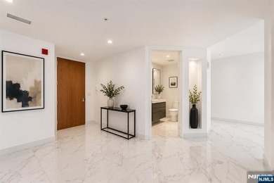 CAN BE SPLIT INTO 2 UNITS!! Perched on the 16th floor of the - photo 6