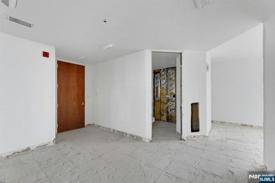 CAN BE SPLIT INTO 2 UNITS!! Perched on the 16th floor of the - photo 7